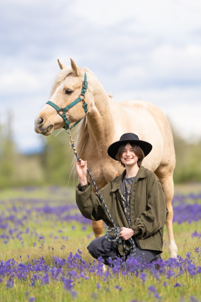 horse and rider western fashion purple flower field