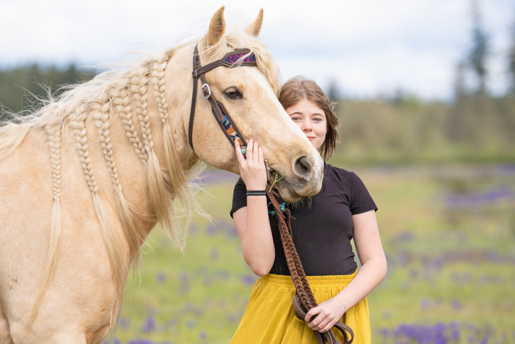 horse and rider western fashion purple flower field