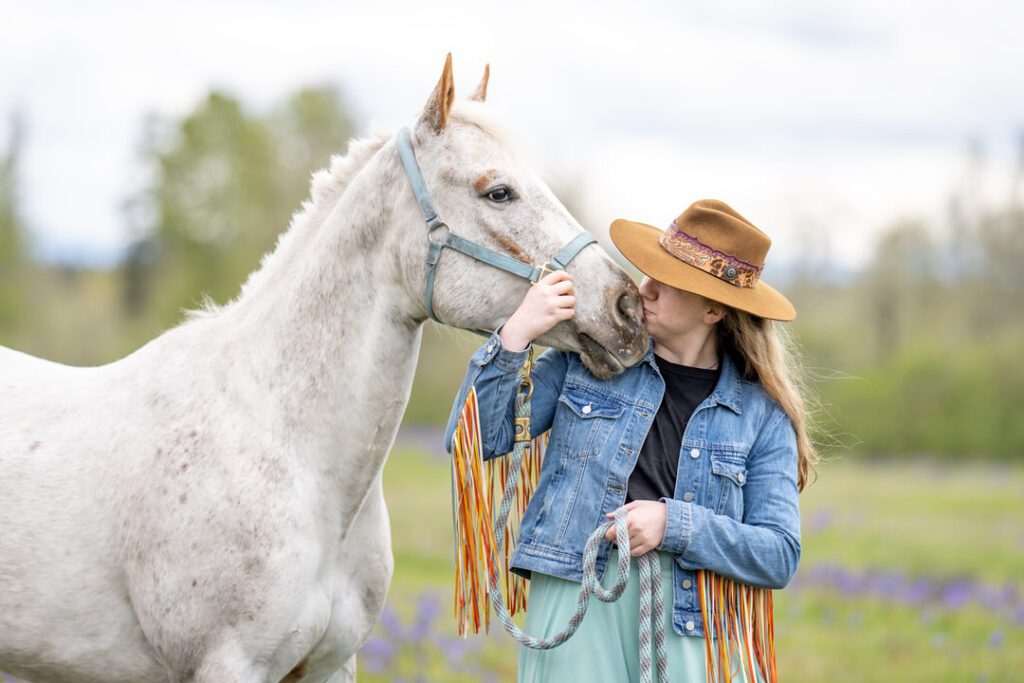 horse and rider western fashion purple flower field