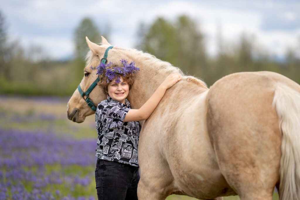 horse and rider western fashion purple flower field