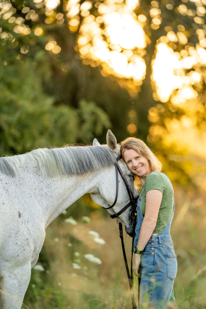 Horse and Rider Cuddling at sunset, meg dunne training